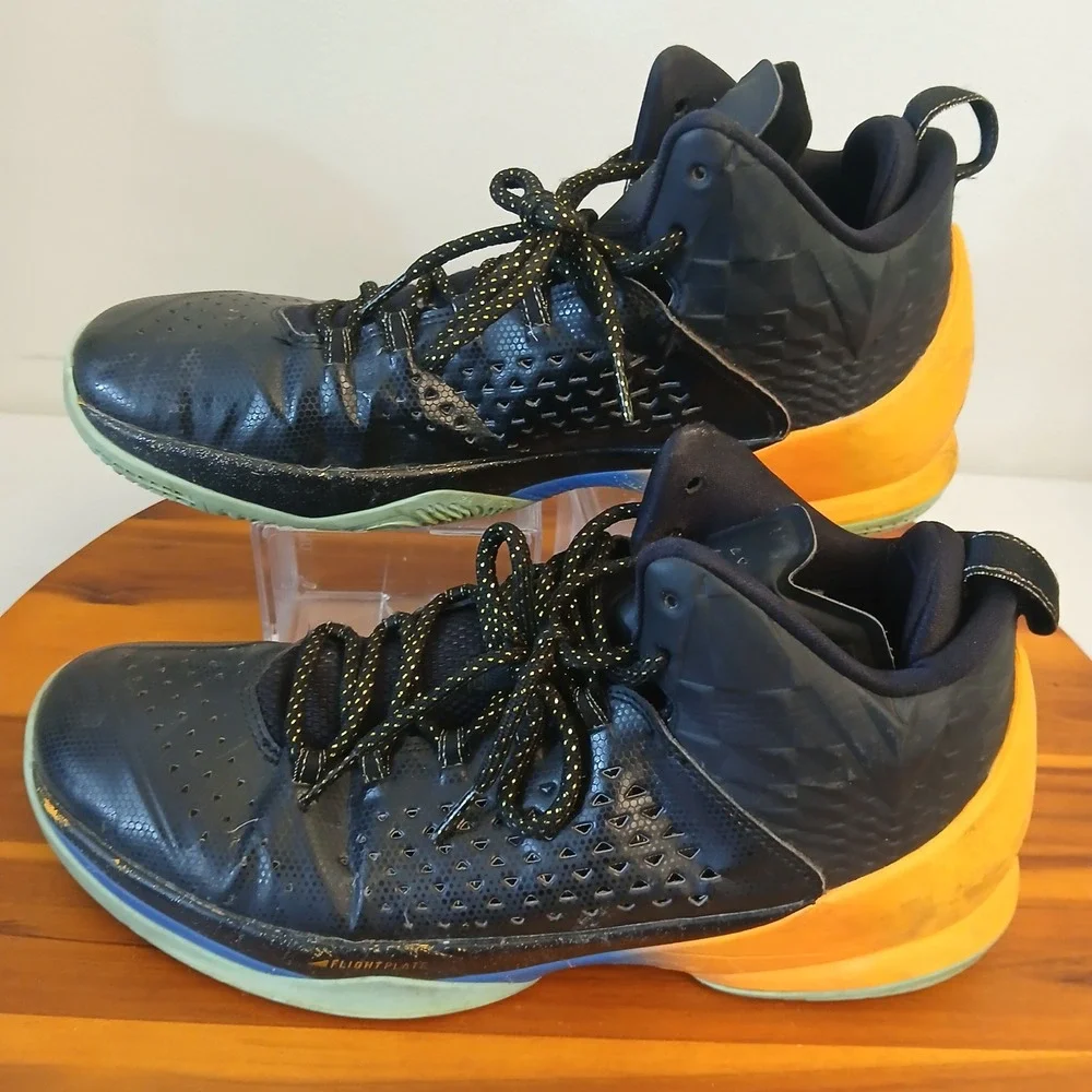 Nike Air Jordan Melo 11 Men 11 Black Orange Running Shoes Sneakers 716227-013